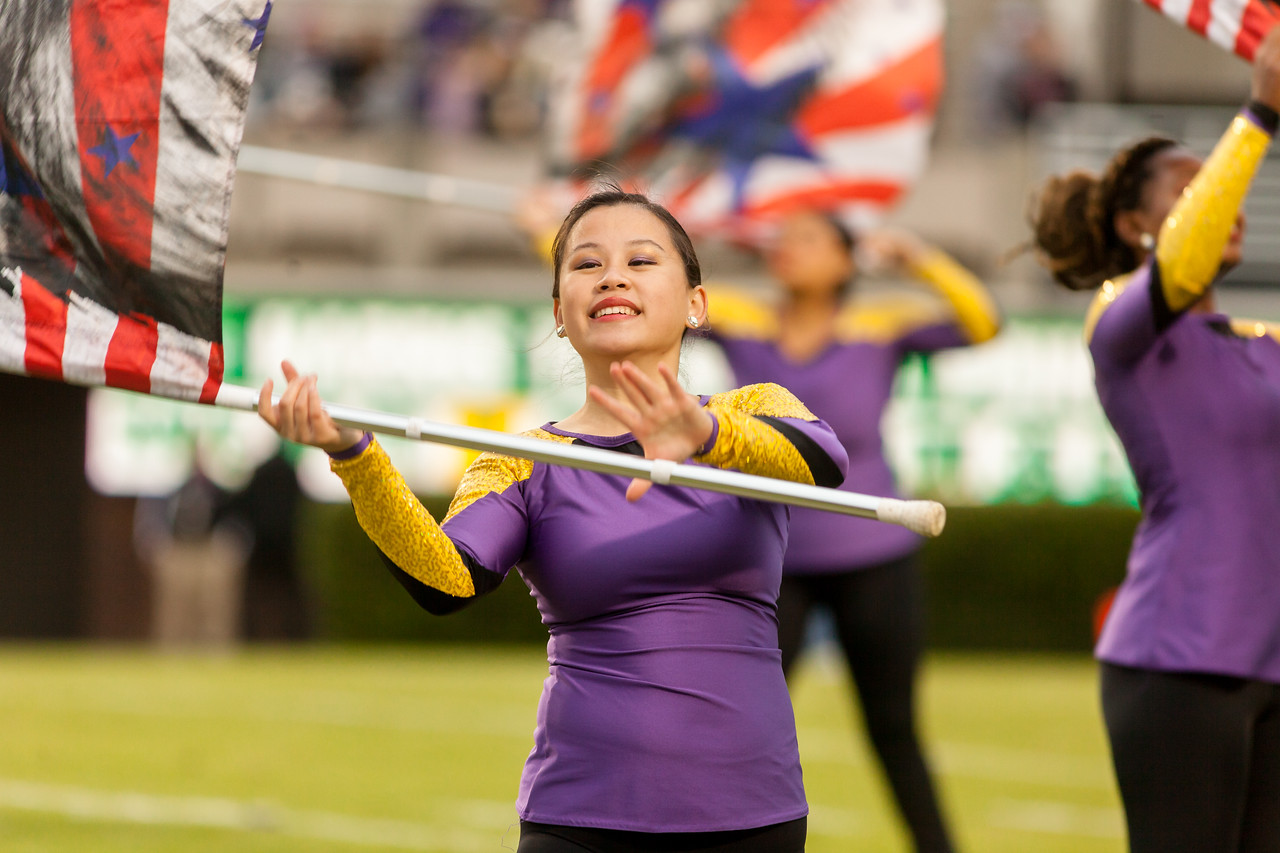 member of ECU colorguard with patriotic themed flag