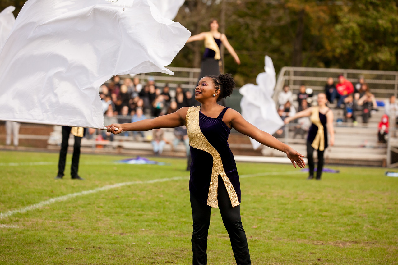 ECU Marching Pirates colorguard member with white flag