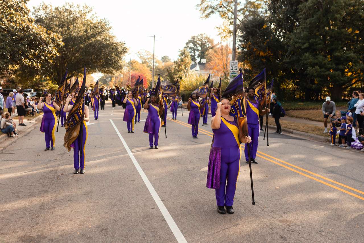 ECU Colorguard Marching in Parada