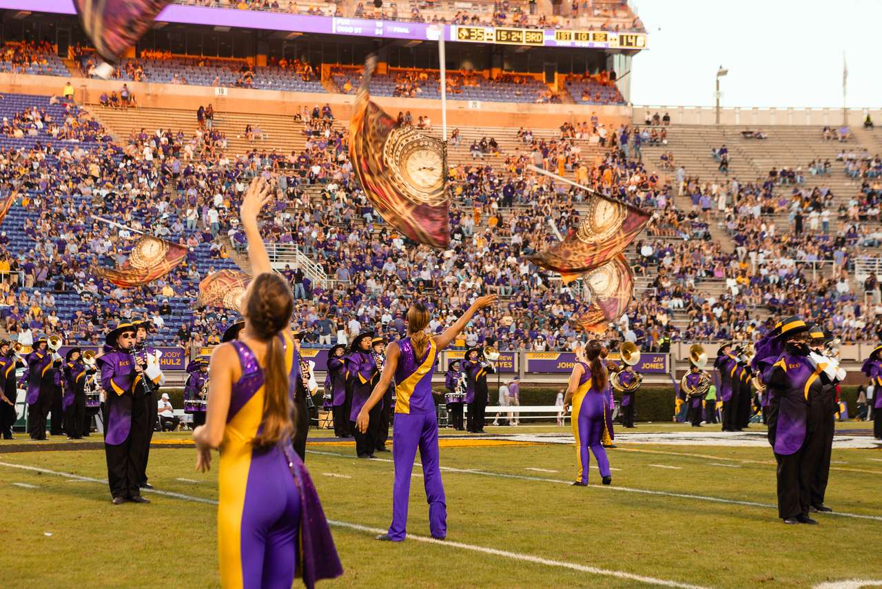 ECU Colorguard performing on the field